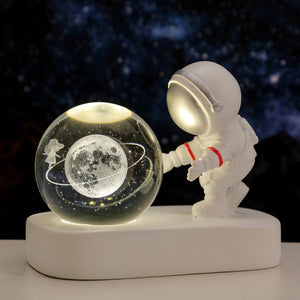 LÁMPARA ASTRONAUTA CON ESFERA (AL AZAR)